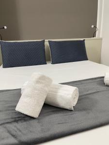 Llit o llits en una habitació de La città del riso