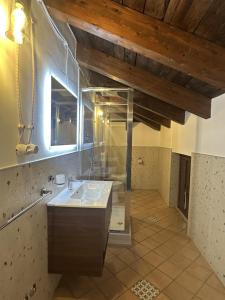 a bathroom with a sink and a mirror at Hotel Sant'Antonio in Torraca