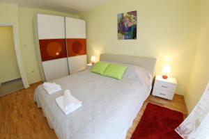 Ein Bett oder Betten in einem Zimmer der Unterkunft Apartment Zubčić