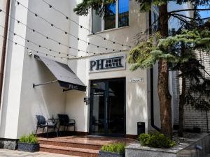 a building with a pizza hut sign on it at Prime Hotel in Dnipro