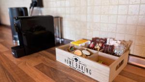 a wooden box with a sign that reads home brewing at Villa Di Mare in Mesimvría +28 photos