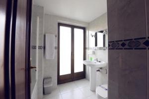 Koupelna v ubytování Hostal Concejo
