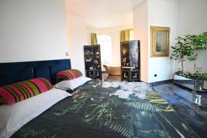 a bedroom with a bed and a bath room at Torre Biancaluna in Vico del Gargano +96 photos