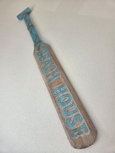 a wooden toothbrush with the word welcome on it at Casa Lumina in Lachapelle-sous-Rougemont +11 photos