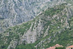 a view of a mountain with houses on it at Nostromo in Kotor