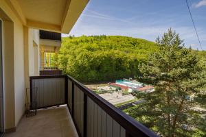 a balcony with a view of a mountain at Apartmán Brezy in Martinske Hole