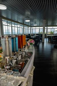 a buffet line with a counter with at Ocean Star Hotel in Koror