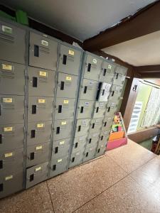 a group of lockers in a room at Yuma Tashi Hostel in Bangkok