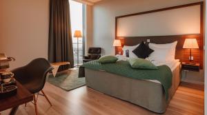 Ένα ή περισσότερα κρεβάτια σε δωμάτιο στο Clarion Hotel Helsinki