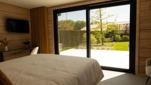 Llit o llits en una habitació de Serenitijd