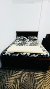a bed sitting in a room with a mattress at Edinburgh Cottage's in Nanu Oya