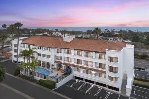 an aerial view of a hotel with the ocean in the background at Hampton Inn & Suites San Clemente - Fully Renovated in San Clemente