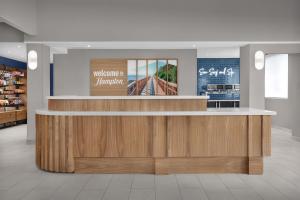a lobby of a store with a reception counter at Hampton Inn & Suites San Clemente - Fully Renovated in San Clemente