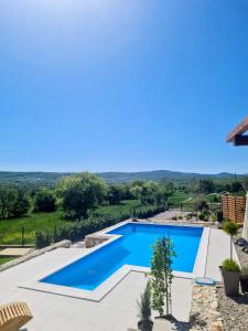 a pool in a villa with a view at Kamena kuća Goranci in Mostar