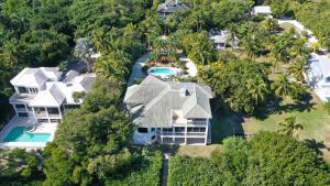 an aerial view of a large house with a swimming pool at Royal Palm House in Captiva