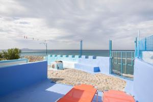 a view of the ocean from the balcony of a house at Villa Sissy in Kerames