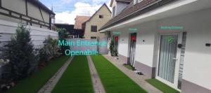 a house with a yard with green grass at Haven Sierentz in Sierentz +3 photos