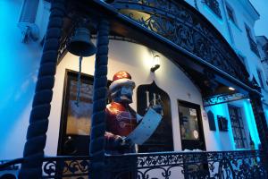 a window of a store with a statue in it at Boutique Hotel Ioann Vasilievich in Yaroslavl