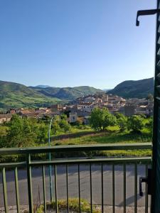 a view of a city from a balcony at Casa Paradiso in Palazzo Adriano
