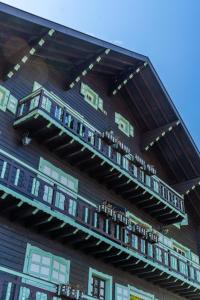 a building with balconies on the side of it at Waterfront in Lugrin +9 photos
