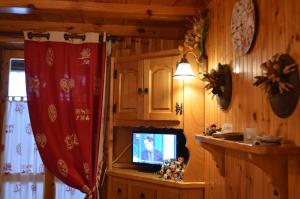 TV a/nebo společenská místnost v ubytování B&B Lepetitnid + 18 fotografií