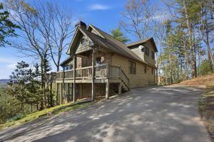 a house on a hill with a driveway at Not Your Average Bear Hot Tub in Blue Ridge +40 photos