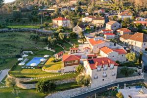 an aerial view of a house with a yard at Casas de Selim in Arcos de Valdevez