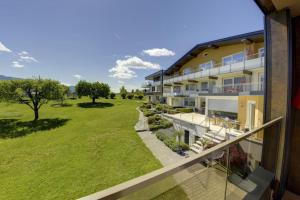 an aerial view of a building with a yard at Seepark Drobollach in Drobollach am Faaker See
