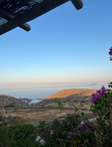 a view of the ocean from the top of a hill at Kelya Houses in Kithnos