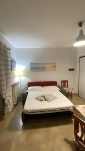 a bedroom with a large bed in a room at Near Sea in Monopoli