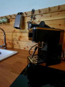 a desk with a laptop computer on top of it at Brick House in Fürstenfeld +23 photos