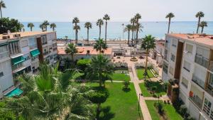 an aerial view of the ocean from a apartment building at Luxury White Summer Benalmadena in Benalmádena