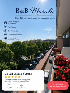 a view of a parking lot with cars on a balcony at Mariclà Boutique Rooms with Balcony & Free Parking in Verona