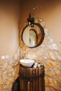 a bathroom with a sink and a mirror at Vida Pura Apartments in Odeceixe +93 photos