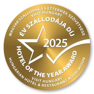 a gold disk with a star and the wordsiversary at Florin Apart Hotel in Budapest