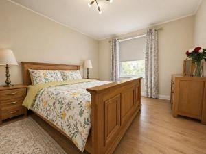 a bedroom with a bed and a window at 2 Bedroom Flat in Manchester