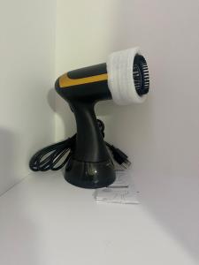a hair brush and a roll of toilet paper at Rosa Bella Comfort Suite in Homestead