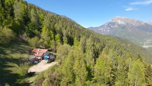 an aerial view of a house on a mountain at Baita Costa Di Gial in Lamon