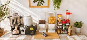 a food processor sitting on top of a table with food at Hôtel Duchesse Anne in Lourdes +24 photos