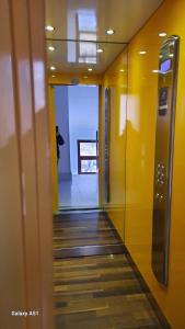 a hallway of an elevator in a building at Le Persiane Azzurre est in Albiano