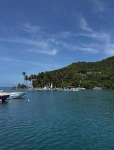a large body of water with boats in it at Cozy Endz in Castries +7 photos