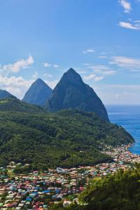 a view of a city with mountains in the background at Cozy Endz in Castries