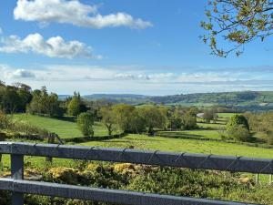 a view of a field from a fence at Hyssington Heights in Hyssington