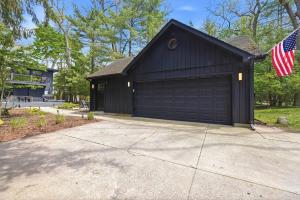 a black garage with a flag in front of it at Sunset on Pokagon in Michiana +58 photos