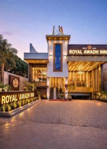 a building with a brick driveway in front of it at Royal Awadh Inn in Ayodhya