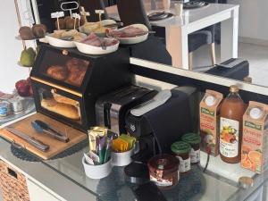a counter with some food on top at Villa Horizon in Nice +12 photos