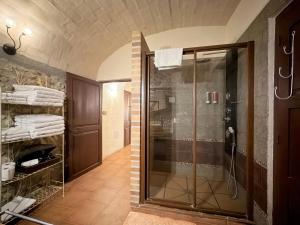 a bathroom with a walk in shower and a glass shower stall at VentallóLEscala. WiFi. Rooftop w stunning views in Ventalló +94 photos