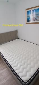 a mattress on a bed frame in a room at Yemanja Guest Flat- vue Mer &Salin, piscine, climatisation in Gruissan