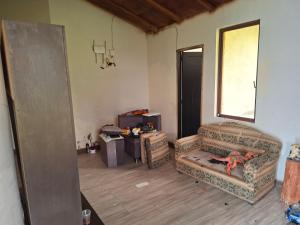 a living room with a couch and a table at San Martin in Ibarra