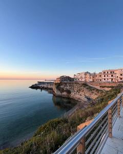 a view of the ocean from a balcony at Almarè Confort Rooms in Terrasini